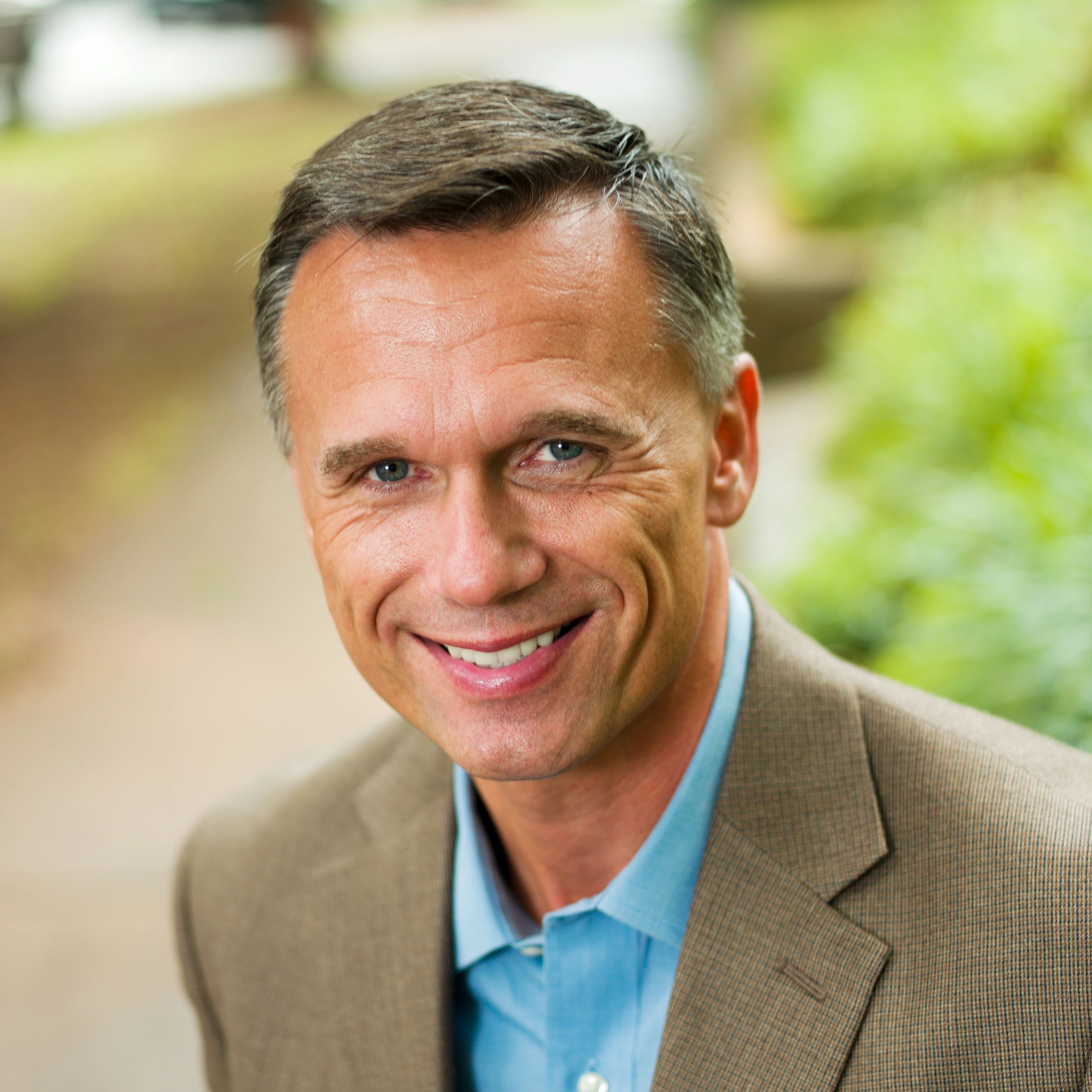 Professional headshot representing a client business systems director