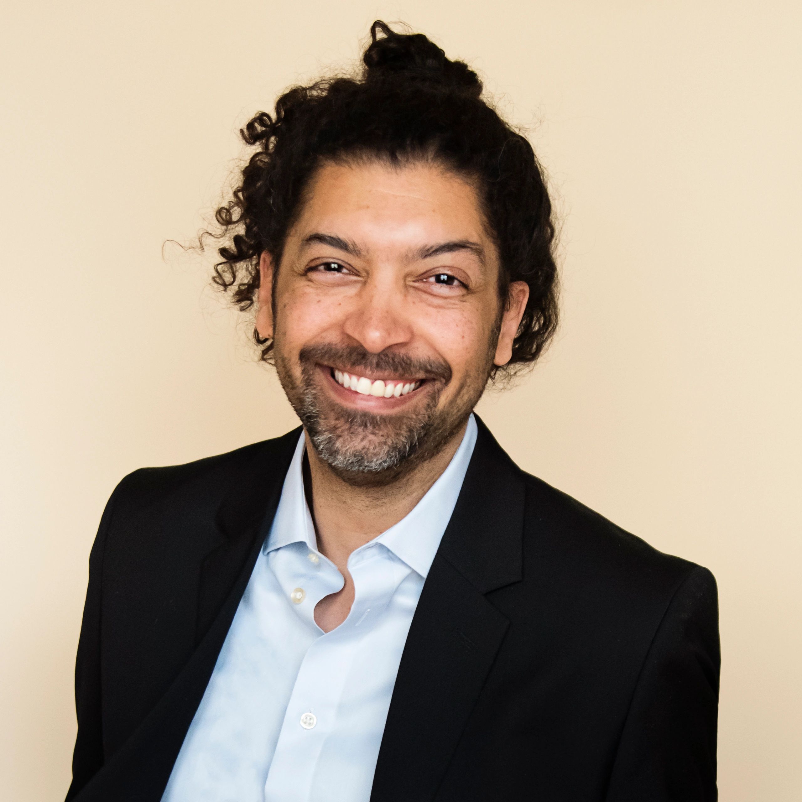 Professional headshot representing a client operations manager