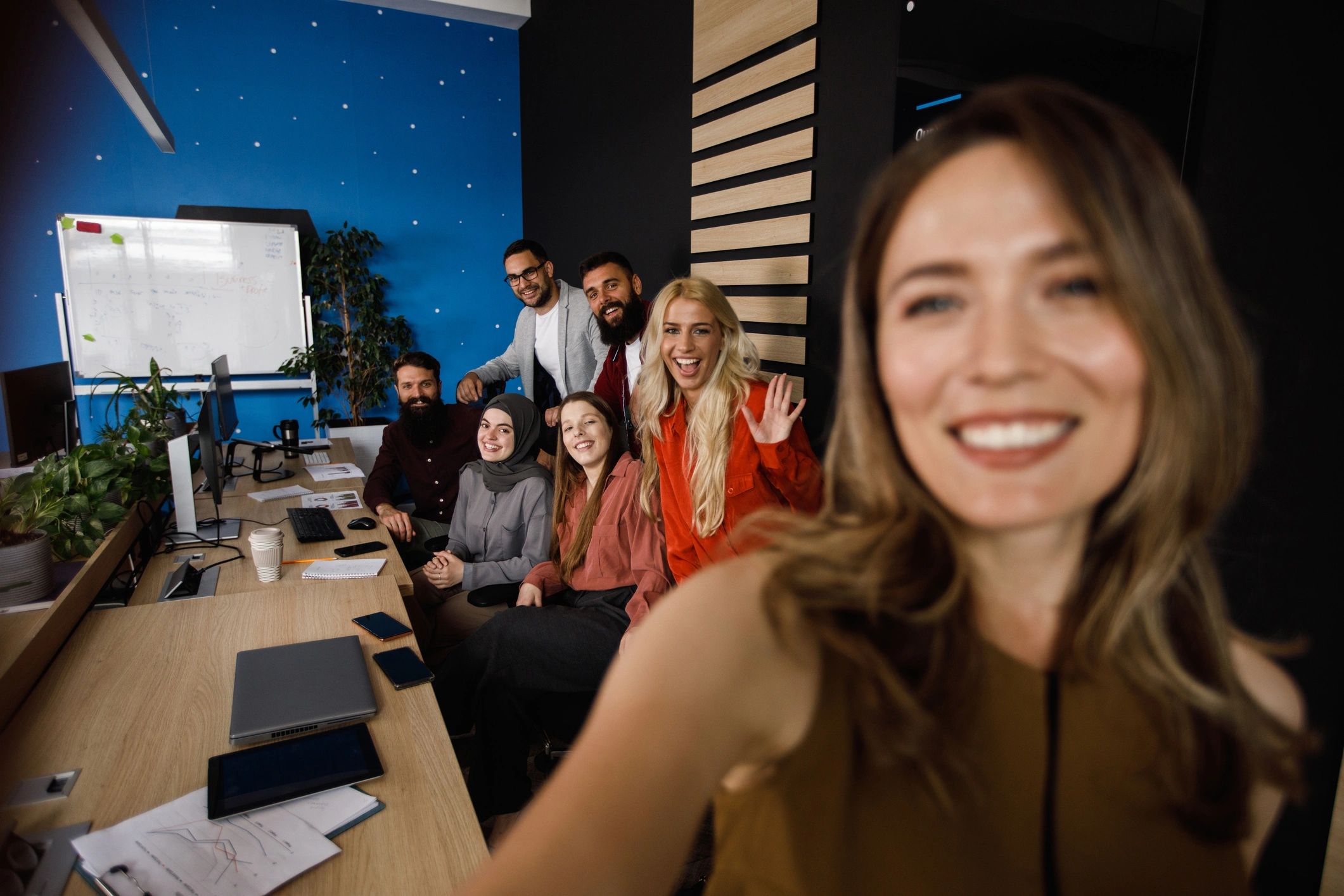 Software and operations team working together in a collaborative workspace
